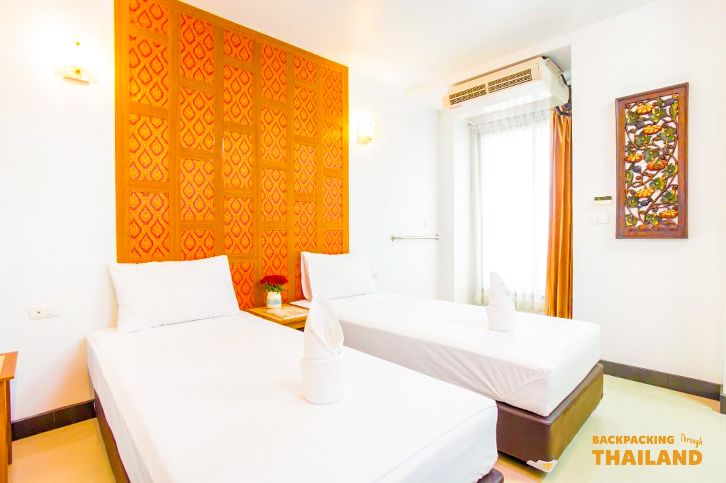 Twin bedroom at New Siam Ville Bangkok for first night stay.