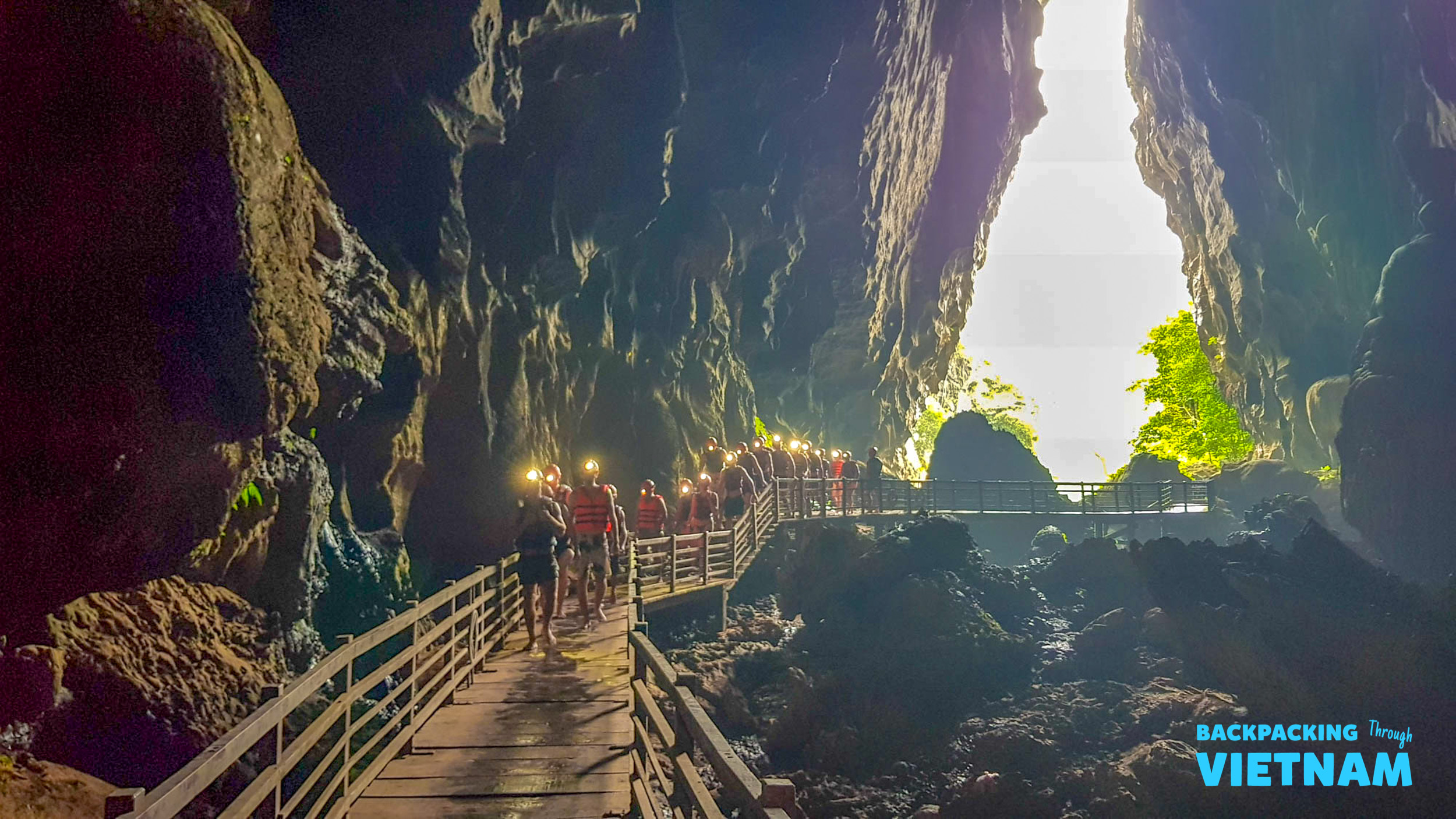Exploring Paradise Cave with stalactites in Phong Nha