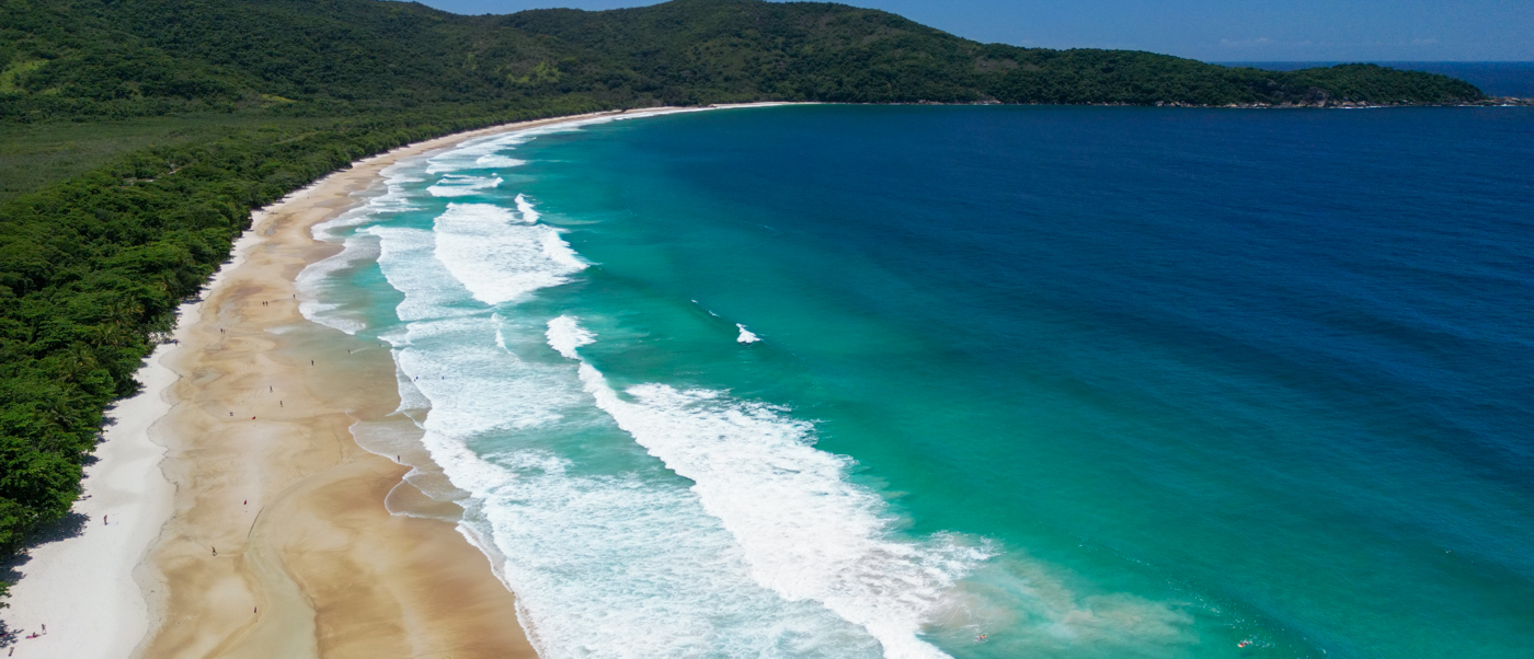 The powder-soft white sand of Lopes Mendes beach on Ilha Grande