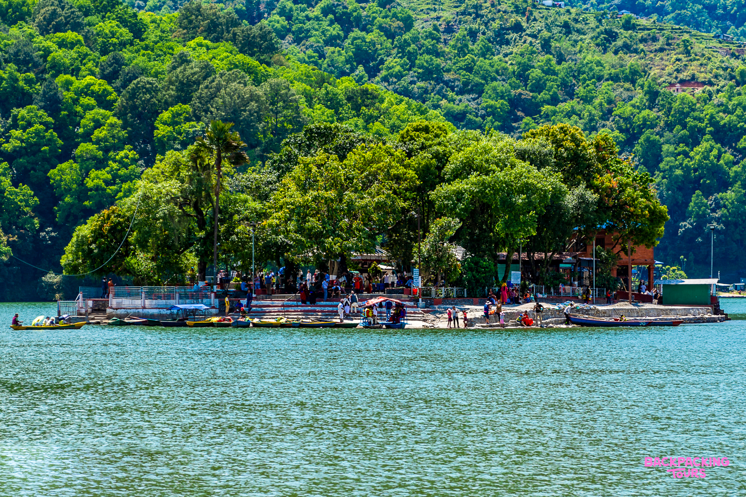 Visitors gather at the historic Tal Barahi Temple on an island in Pokhara's beautiful Phewa Lake.