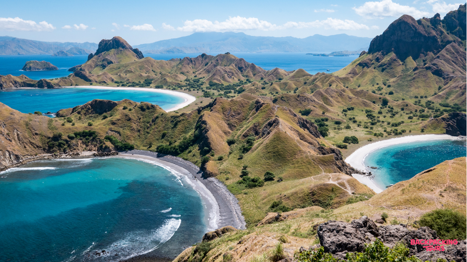 Stunning panoramic view of rugged islands with white sand beaches and turquoise bays in Komodo National Park.