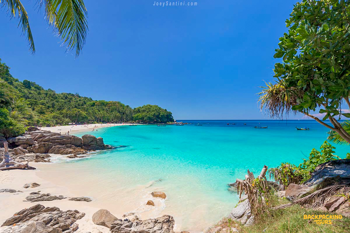 Enjoy a beautiful day on the glistening white sands and clear turquoise waters of Phuket.